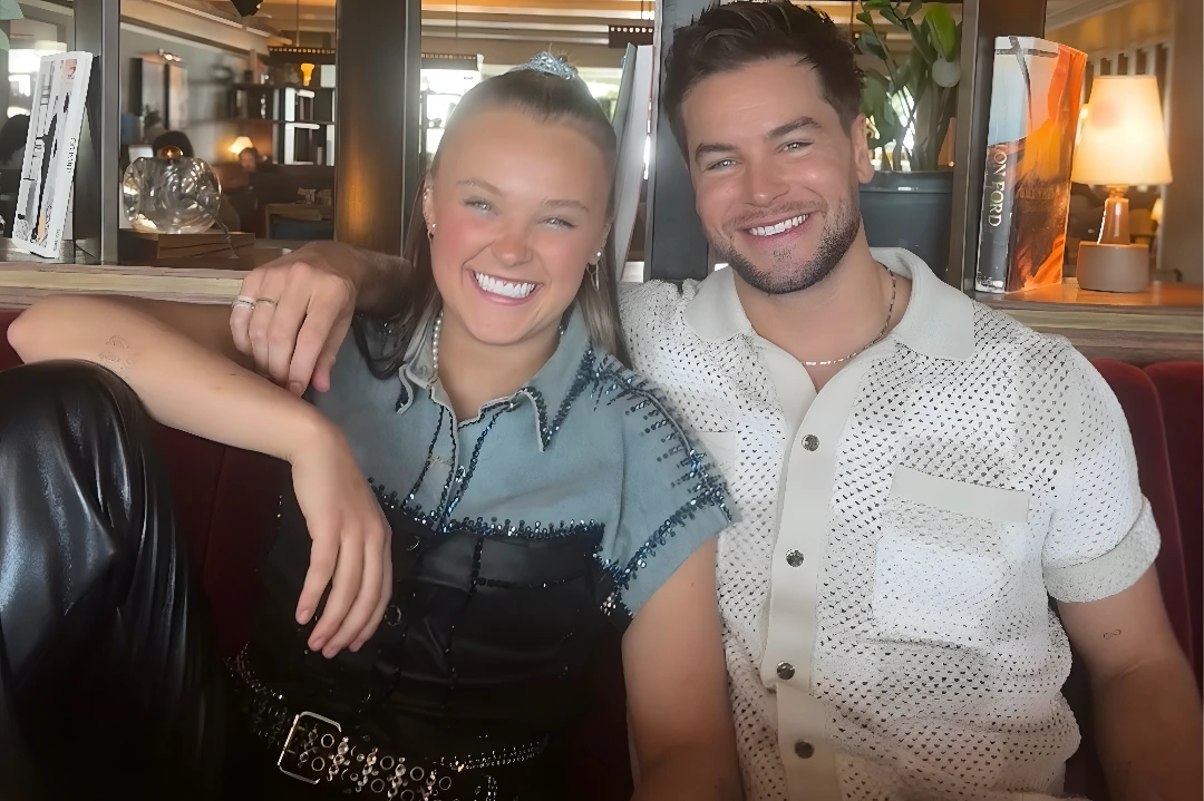 JoJo Siwa and Chris Hughes celebrating their one year anniversary in 2026